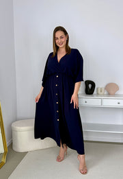 GRETA GŁADKA SUKIENKA PLUS SIZE Z ROZKLOSZOWANYM DOŁEM I GUZIKAMI. GRANATOWA 03 image 5