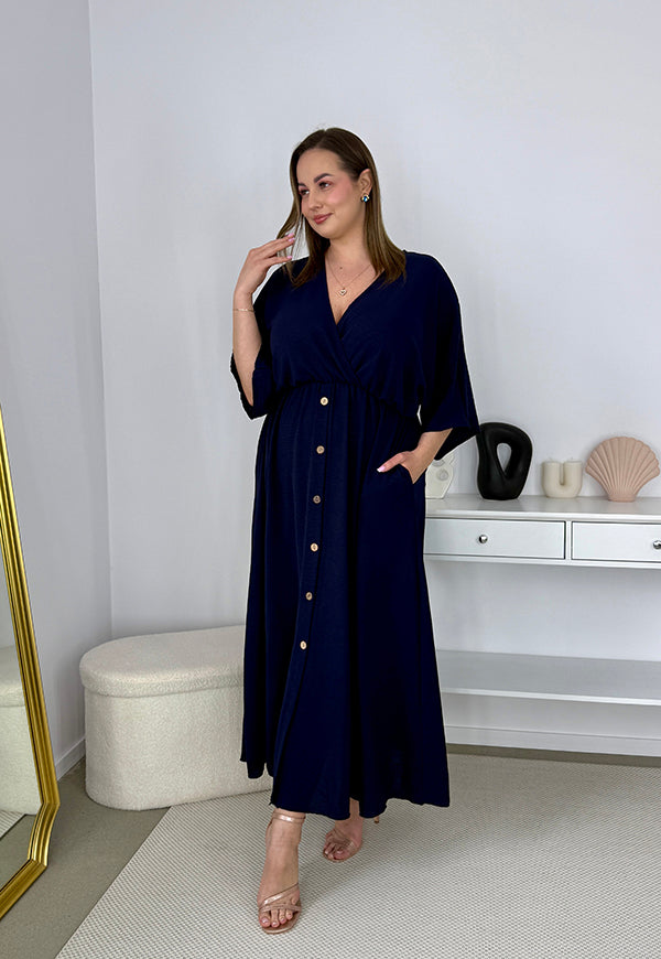 GRETA GŁADKA SUKIENKA PLUS SIZE Z ROZKLOSZOWANYM DOŁEM I GUZIKAMI. GRANATOWA 03