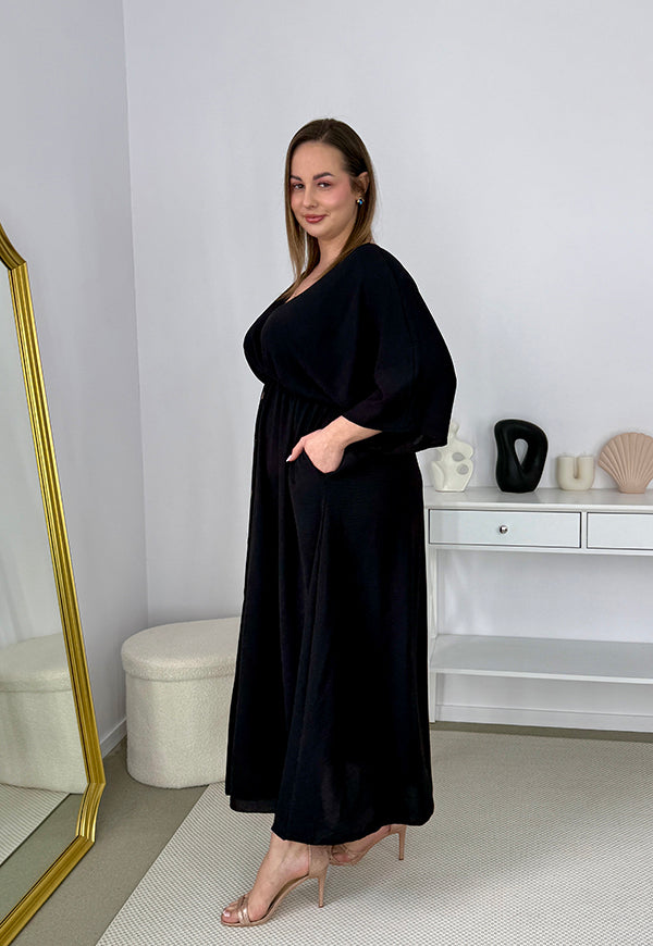 GRETA GŁADKA SUKIENKA PLUS SIZE Z ROZKLOSZOWANYM DOŁEM I GUZIKAMI. CZARNA 01 image 8