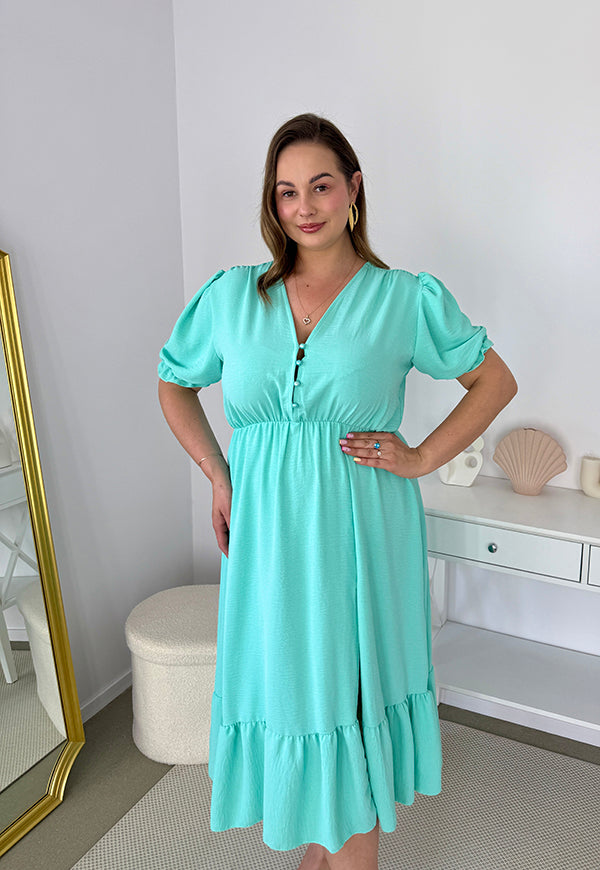 AMANDA GŁADKA MAXI PLUS SIZE SUKIENKA Z KRÓTKIMI RĘKAWAMI PRZED DŁUGA Z GUZIKAMI. MIETOWA 03 image 2